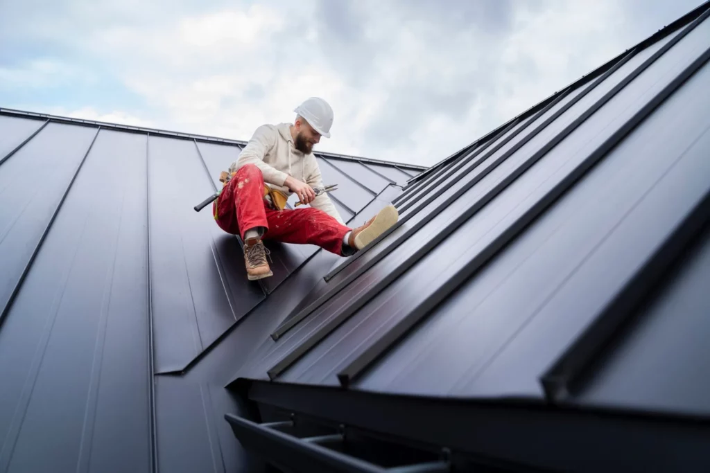 image of a roofer installing a roof